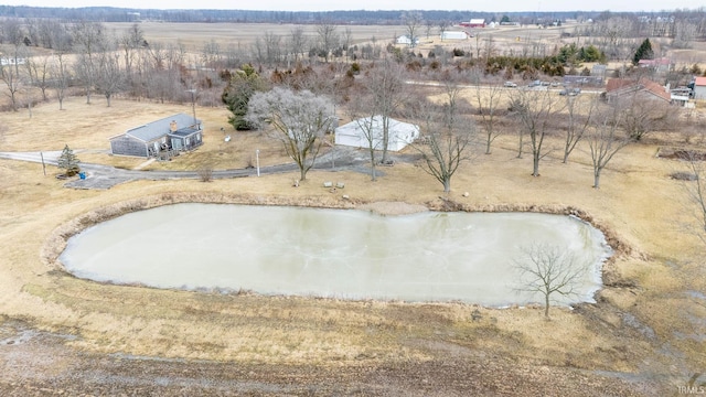 drone / aerial view with a rural view and a water view