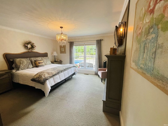 carpeted bedroom featuring ornamental molding and an inviting chandelier