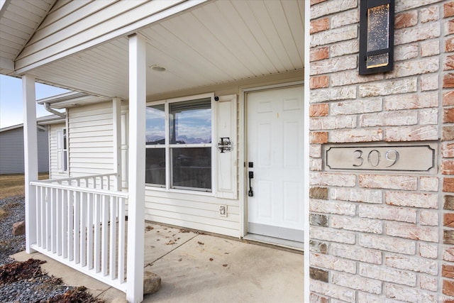 property entrance with a porch