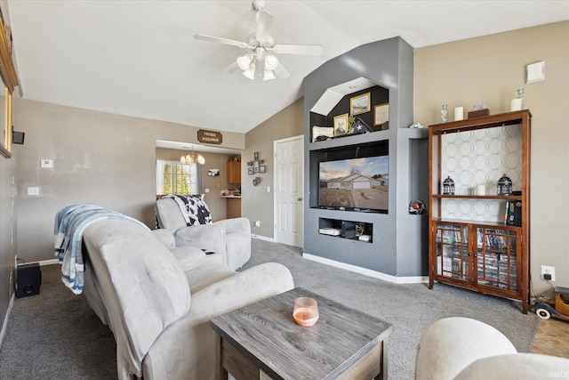 living room with carpet flooring, vaulted ceiling, baseboards, and ceiling fan with notable chandelier