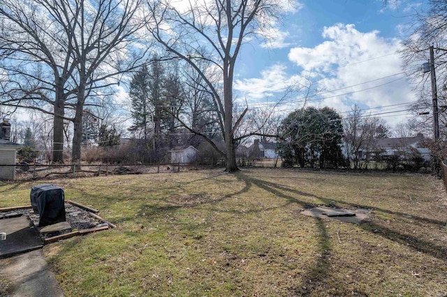 view of yard with fence