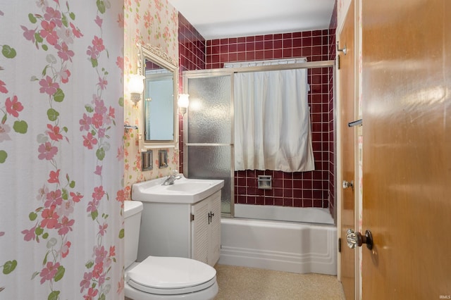 bathroom featuring toilet, bathtub / shower combination, and vanity