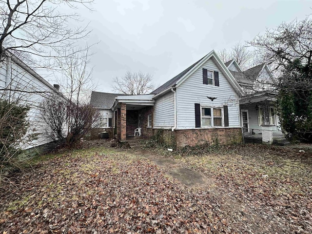 view of front of house with brick siding