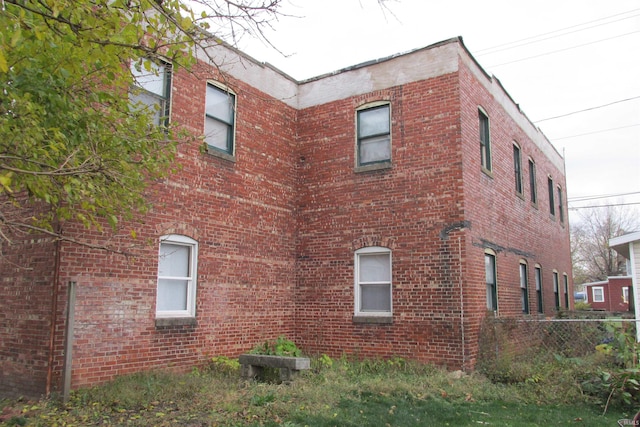 view of property featuring fence