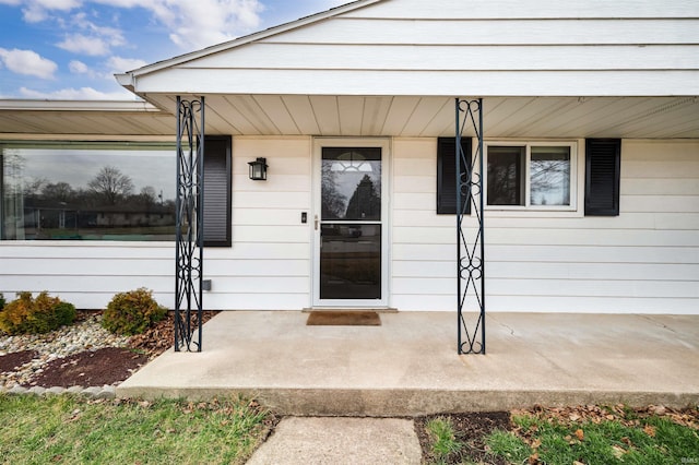 entrance to property with a porch