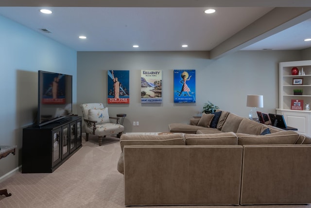 living room featuring baseboards, recessed lighting, visible vents, and light colored carpet