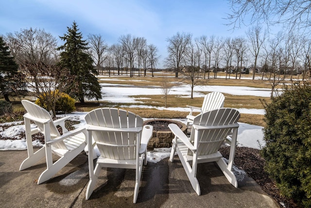 view of patio / terrace with a fire pit