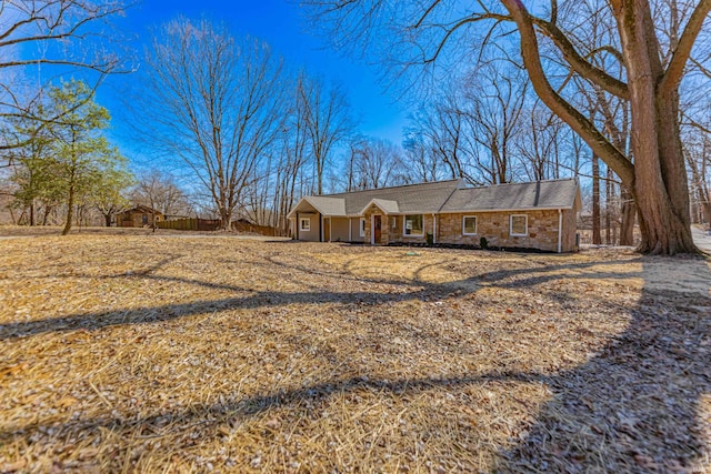 view of front of home with stone siding