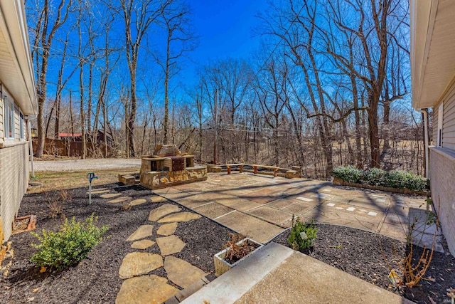 view of patio featuring fence