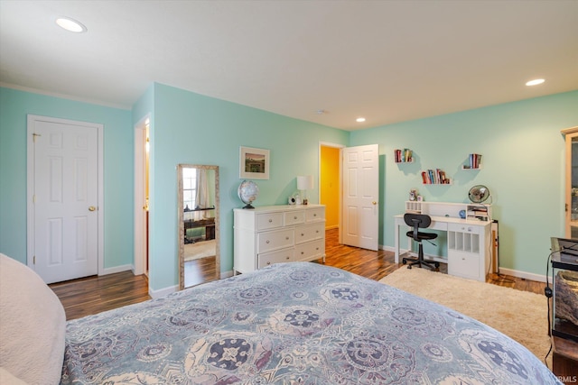 bedroom featuring recessed lighting, baseboards, and wood finished floors