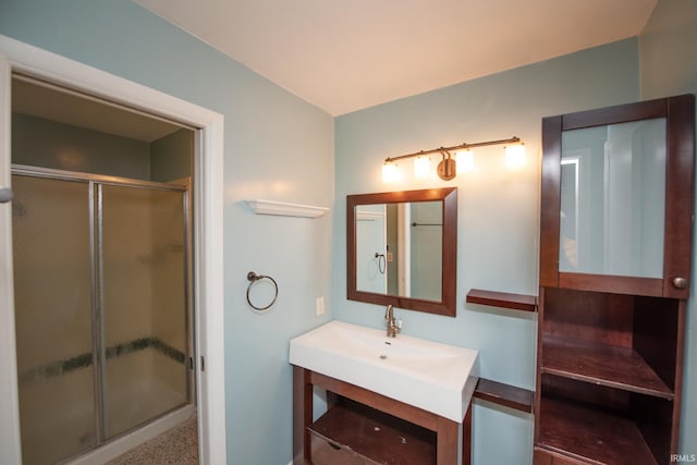 full bathroom featuring a shower stall and vanity