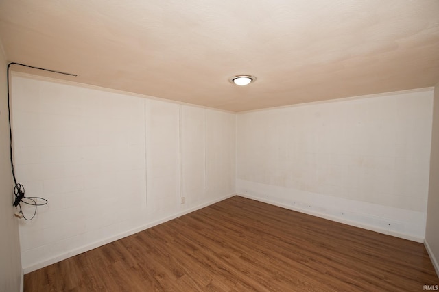 empty room with wood finished floors