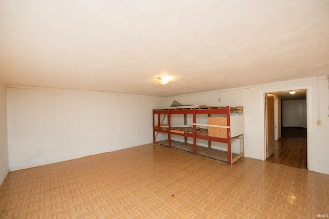 basement with parquet floors