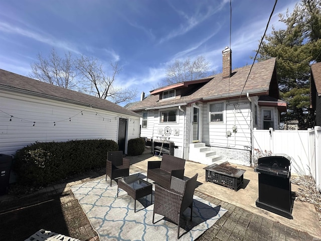 view of patio / terrace with entry steps, an outdoor living space with a fire pit, a grill, and fence