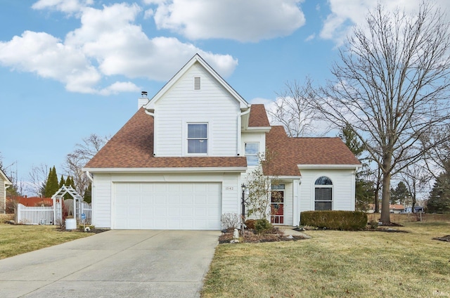 traditional home with a chimney, a shingled roof, fence, driveway, and a front lawn