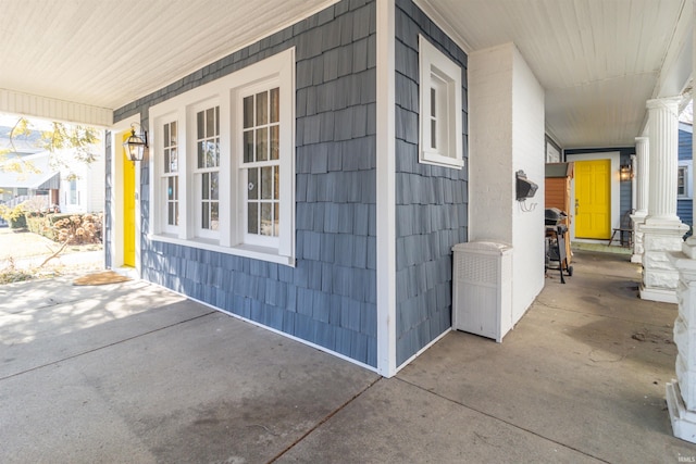 view of home's exterior with covered porch