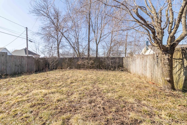 view of yard featuring a fenced backyard