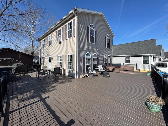 deck featuring outdoor dining area