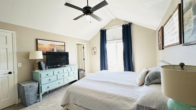 bedroom featuring lofted ceiling with beams, carpet floors, a textured ceiling, and a ceiling fan