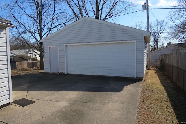 detached garage with fence