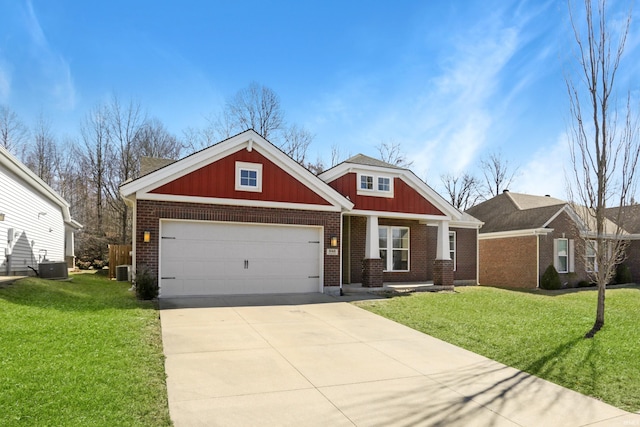 craftsman-style home with a garage, a front yard, brick siding, and driveway