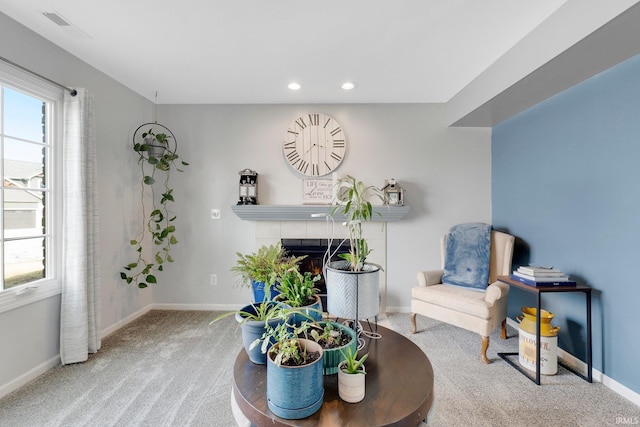 sitting room featuring carpet floors, recessed lighting, a fireplace, and baseboards