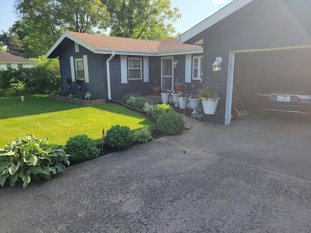 single story home featuring driveway and a front lawn