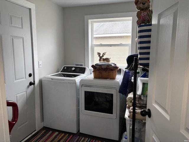 laundry room featuring laundry area and washer and clothes dryer