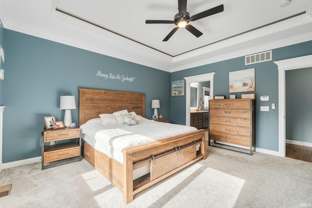 carpeted bedroom featuring ornamental molding, visible vents, and baseboards