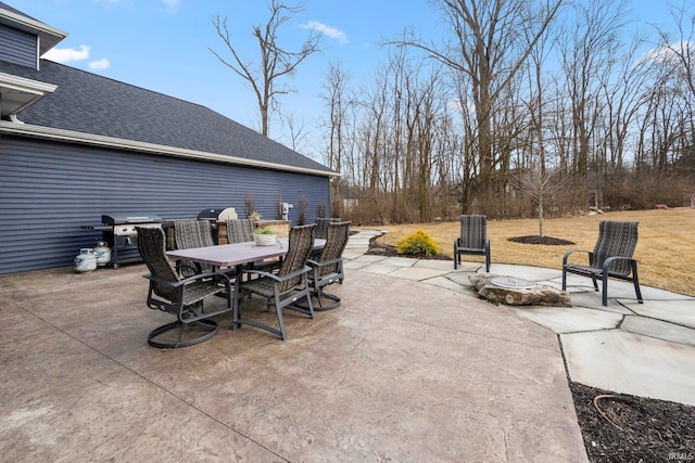 view of patio featuring grilling area and outdoor dining space