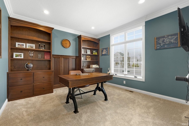 office area featuring light carpet, visible vents, ornamental molding, and baseboards