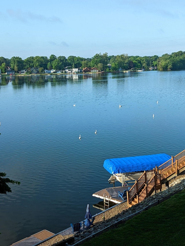 dock area featuring a water view