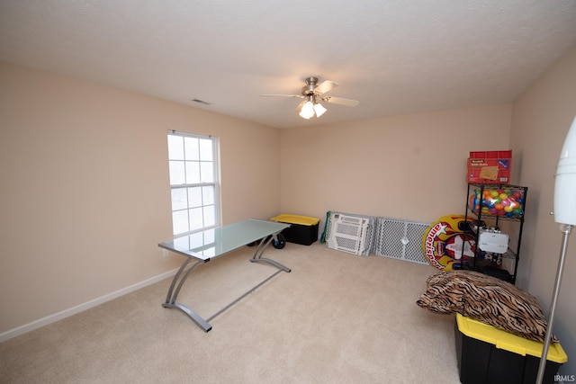 game room featuring ceiling fan, baseboards, and carpet flooring