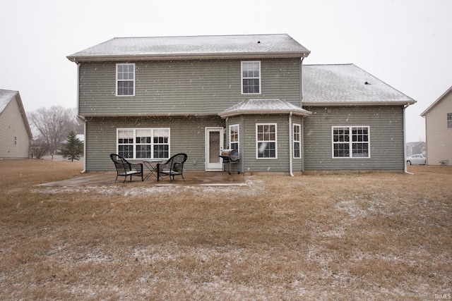 back of house featuring a patio area