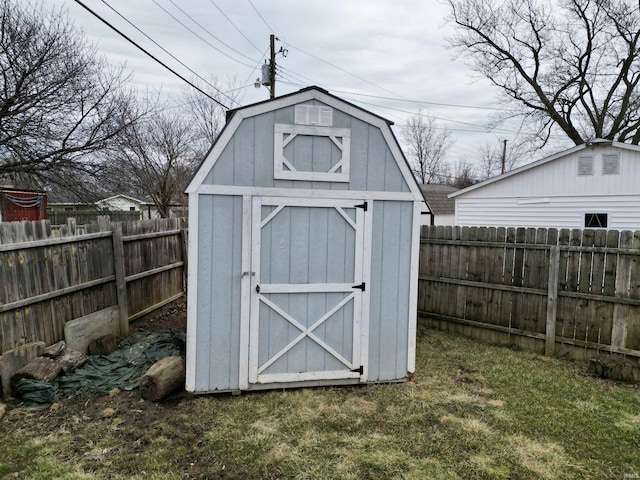 view of shed featuring a fenced backyard