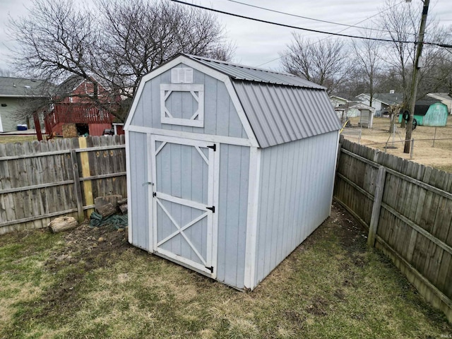 view of shed featuring a fenced backyard