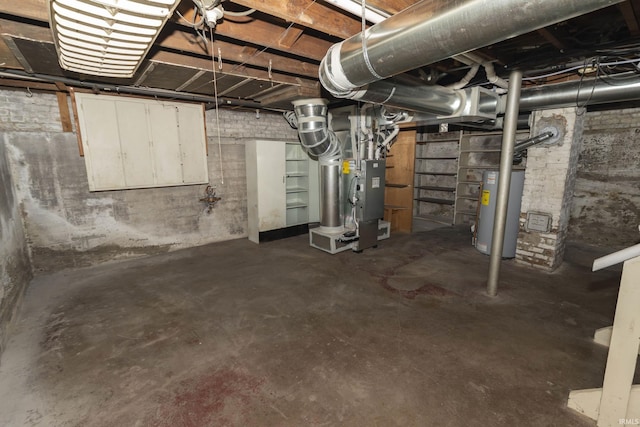 unfinished basement featuring heating unit and water heater