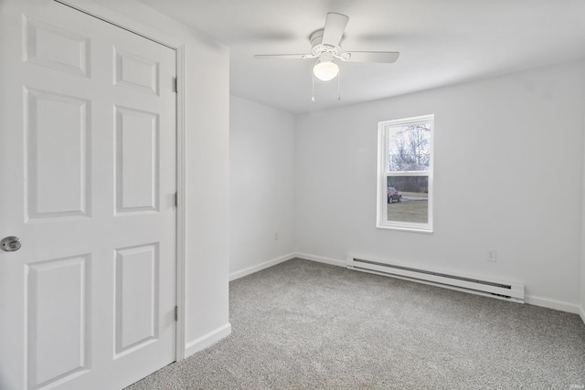 empty room with a ceiling fan, carpet, baseboards, and baseboard heating