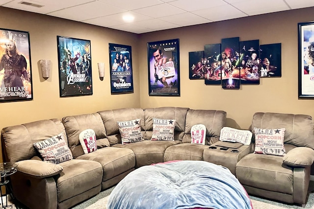 home theater featuring a paneled ceiling and visible vents