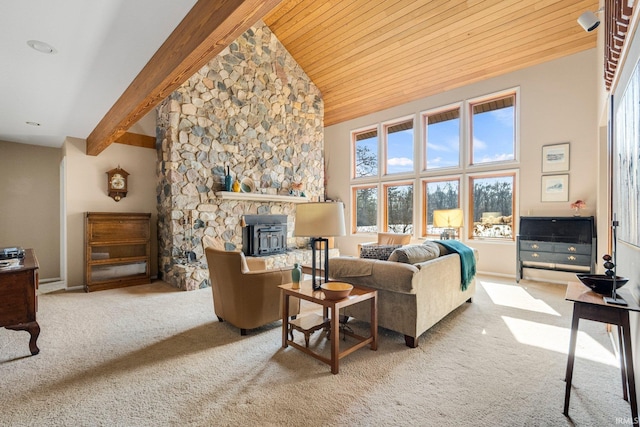 living area with carpet floors, a wood stove, beamed ceiling, and high vaulted ceiling