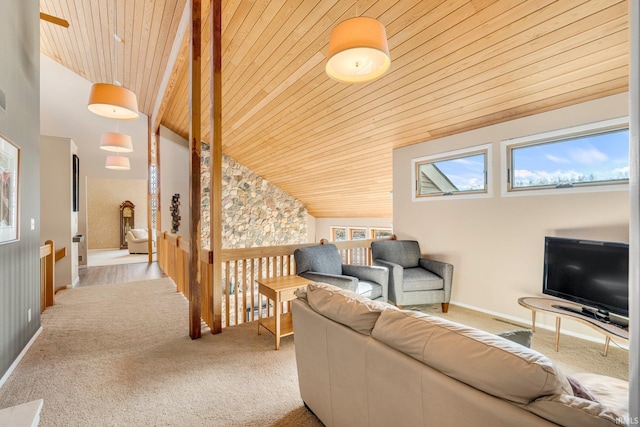 carpeted living area with wooden ceiling, plenty of natural light, and baseboards