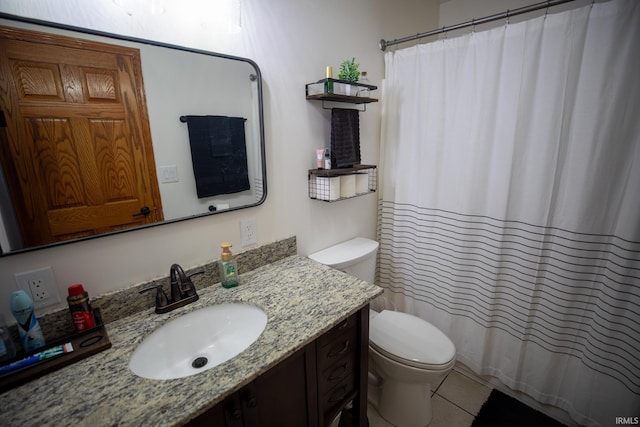 bathroom featuring tile patterned floors, vanity, toilet, and a shower with curtain