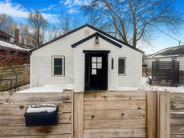 view of outdoor structure with fence