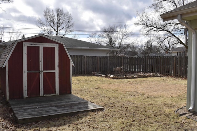 view of shed with fence