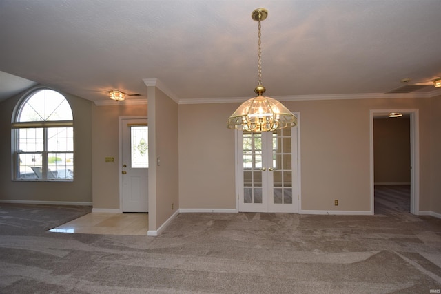 interior space with carpet floors, baseboards, and crown molding