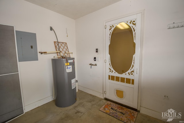 utility room featuring electric panel and electric water heater