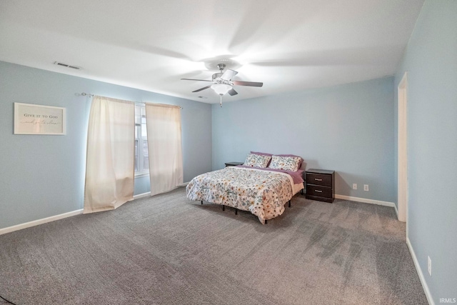 bedroom with a ceiling fan, carpet flooring, visible vents, and baseboards