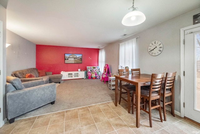 living room featuring light colored carpet