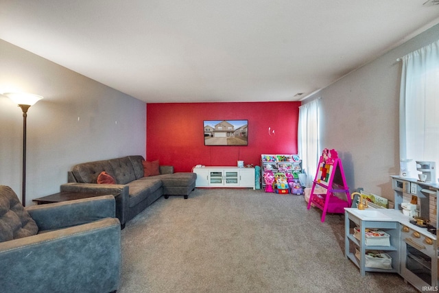 living area with carpet flooring