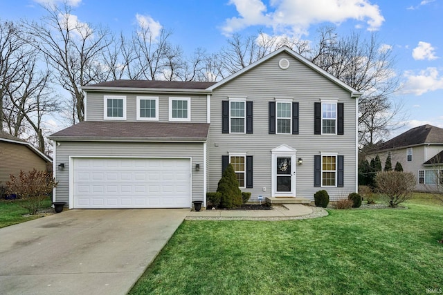 view of front facade with a front yard, driveway, and an attached garage